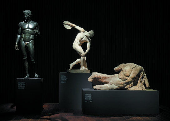 3 statues from, Defining Beauty: The Body in Ancient Greek Art - Doryphoros, Diskobolos and Ilissos. Courtesy of the British Museum.