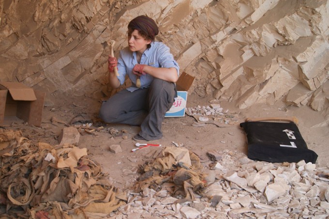 Stanford postdoctoral scholar Anne Austin examines the skeletal remains of ancient Egyptians found in the burial sites of Deir el-Medina. (Photo courtesy of Anne Austin)