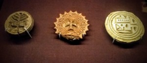 Stamps bearing the distinctive symbols of Judaism, Christianity and Islam - the Menorah, Cross and Arabic script. The British Museum. Photo by Medievalists.net
