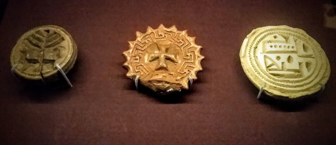 Stamps bearing the distinctive symbols of Judaism, Christianity and Islam - the Menorah, Cross and Arabic script. The British Museum. Photo by Medievalists.net