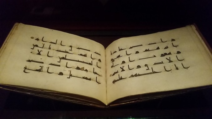 A Qur'an using Kufic script, Middle East, 9th-10th c. AD. One of the three Holy Books that open the exhibit. Photo by Medievalists.net.
